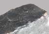 Potassium metal is silvery grey.