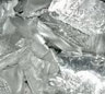 Scandium is a silver-white hard metal which develops a slightly yellowish or pinkish cast upon exposure to air.