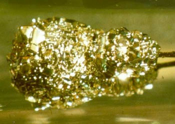 Protactinium crystal, prepared by the van Arkel (chemical vapour transport) process.  (Photo courtesy of the Actinide Group, Institute for Transuranium Elements, Karlsruhe, Germany).